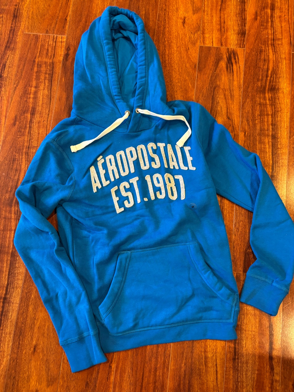 Woman’s blue hoodie sweatshirt